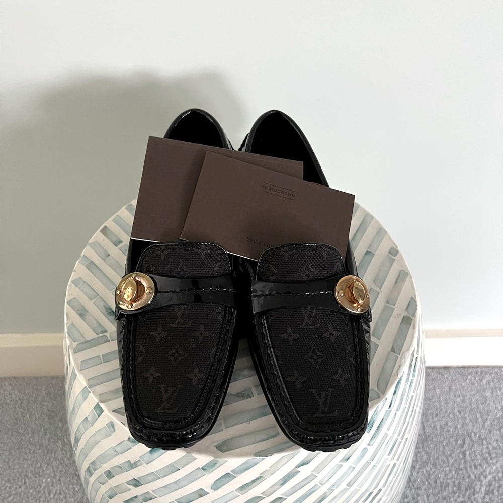 Authentic LV loafer with monogram and patent leather.